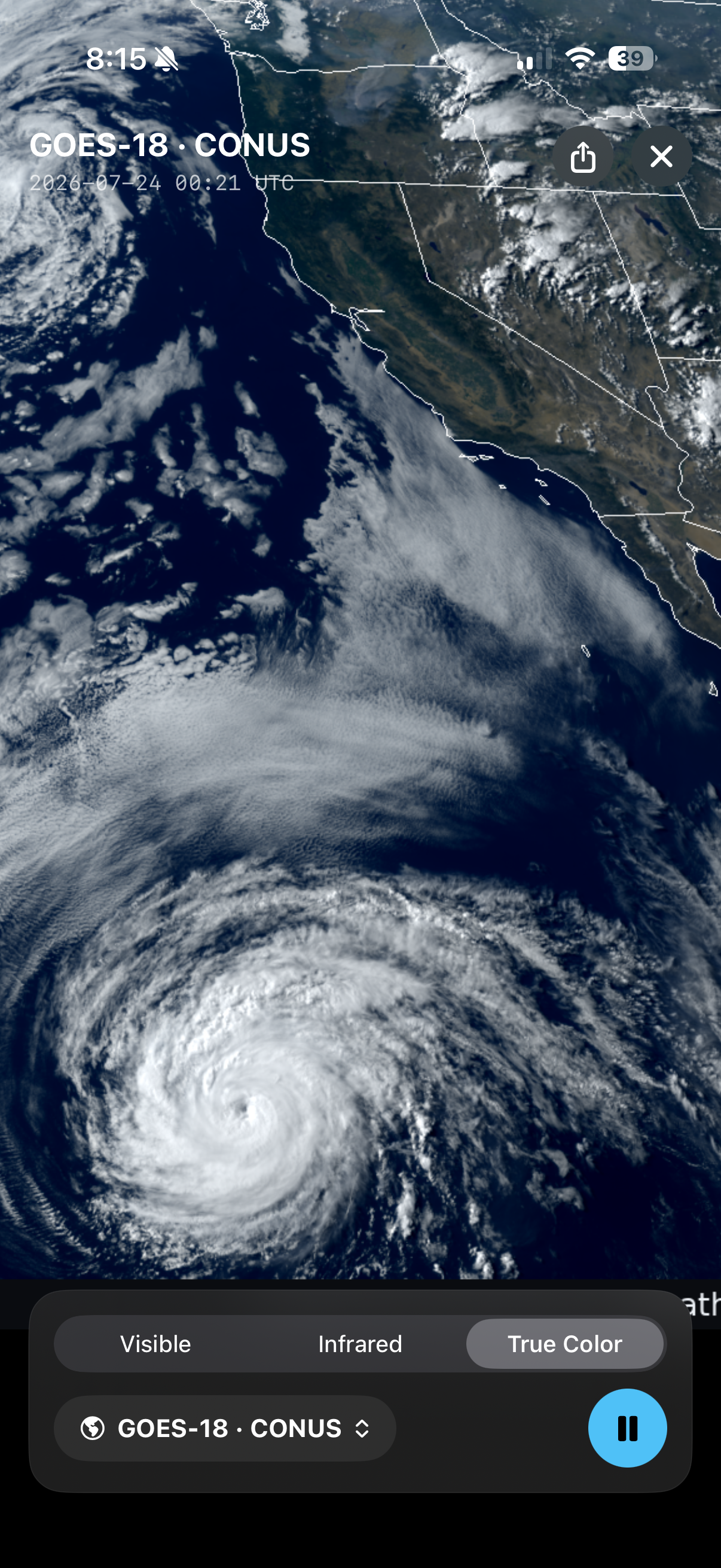 GOES-18 True Color satellite loop of the CONUS west coast and an offshore hurricane