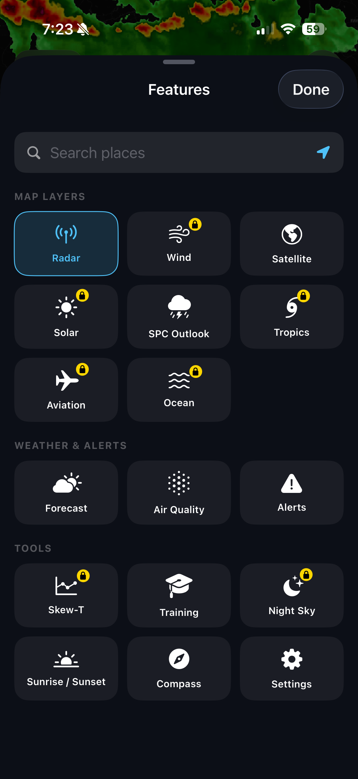 Weather Radar Pro feature menu grid; subscription features marked with a yellow lock